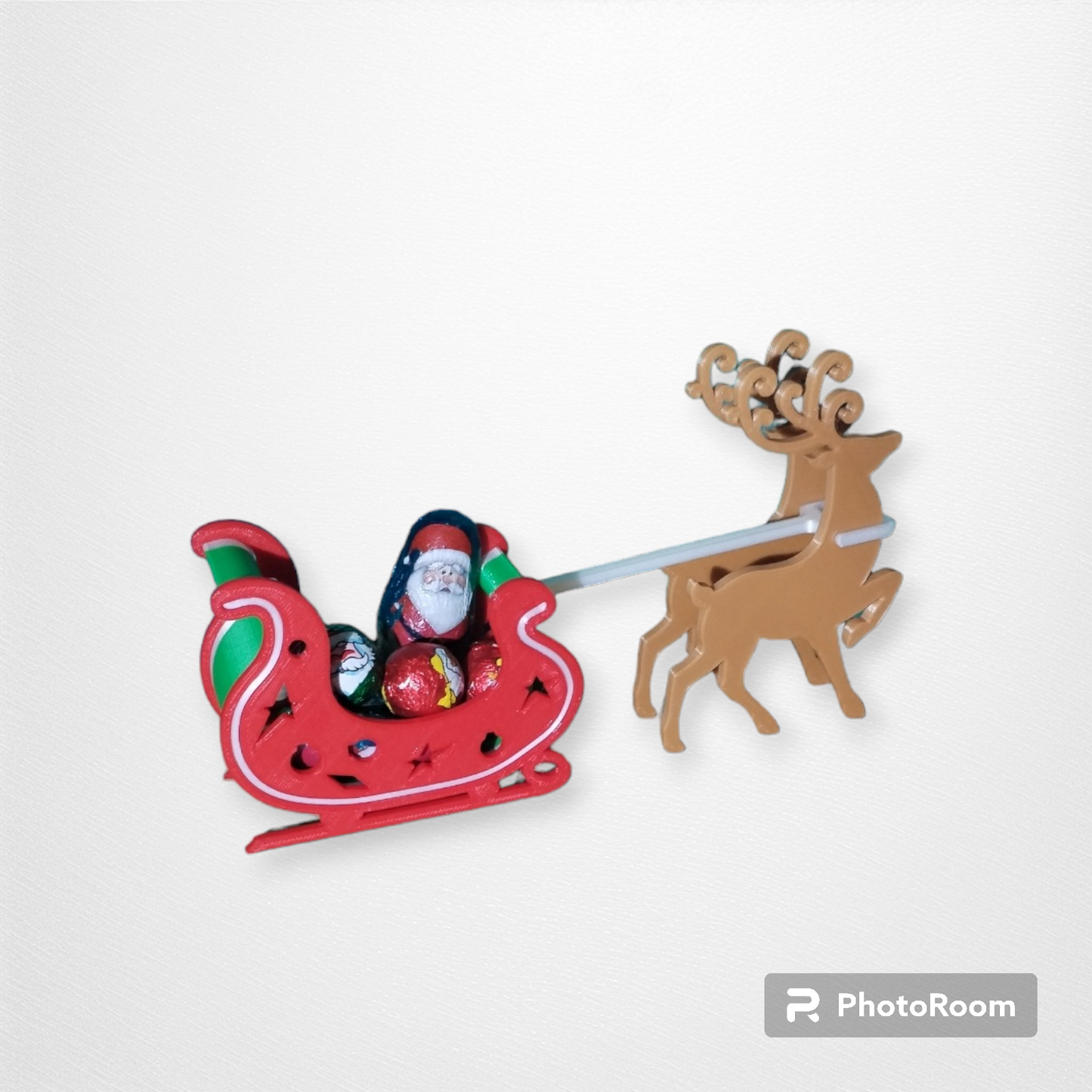 Petit traineau de Noël et ses rennes